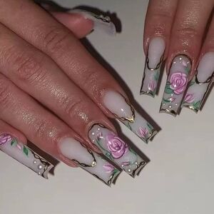 Floral Nail Art with Gold Accents